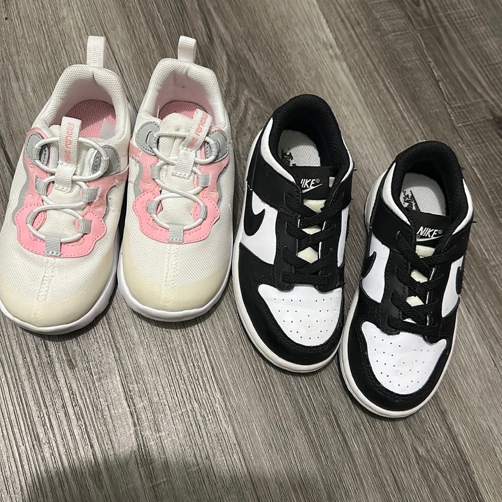 Black Nike is size 8.5 in toddler. Pink and white is size 8 in toddler.